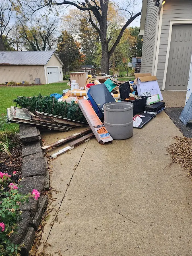 Dumpster being loaded with debris for Commercial Dumpster Rental in Georgia